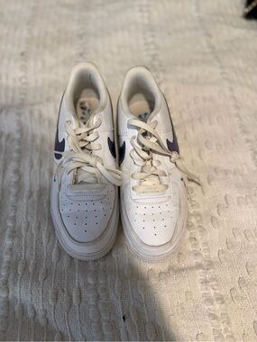 Nike Kids White Sneakers with blue Swoosh